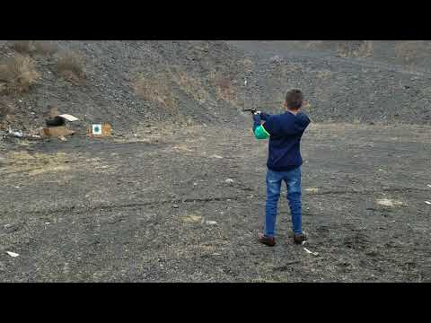 Liam shooting a revolver