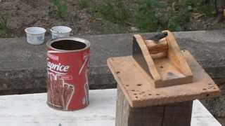 Model cannon tries to knock over a can but..