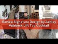 Review Signature Design by Ashley Valebeck Lift Top Cocktail Table, Black/Brown, 36 in x 36 in x 18