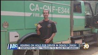 Hearing for woman accused of causing crash that killed firefighter delayed