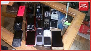 Police conducted a raid on baramulla district jail and recovered 20
cell phones from the inmates. mainly houses terrorists few notorious
s...