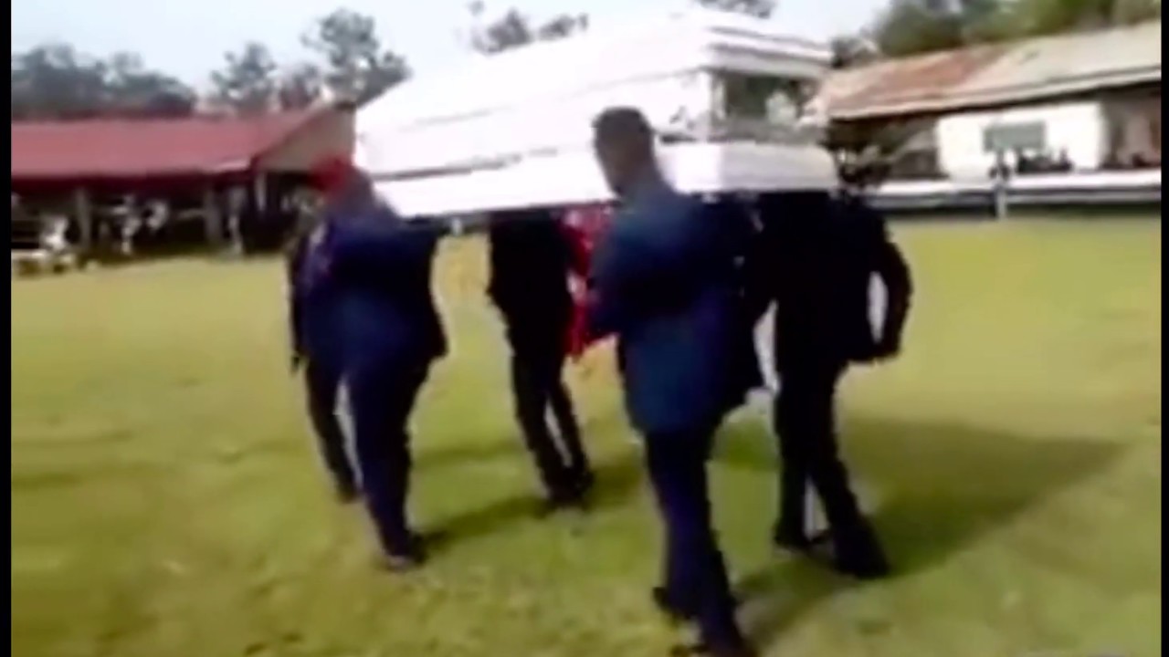 Coffin dancers drop coffin