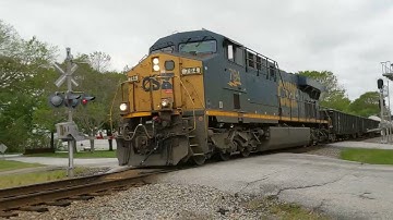 CSX FREIGHT LEAD BY GE ES44AH. MIDTRAIN DPU GE ES44AH AT THE DOVER CONNECTION IN CLINTON SC.