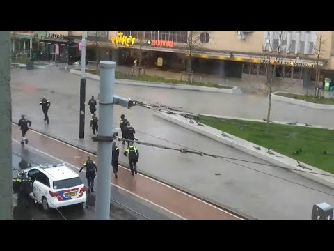Police rush to scene as hostage situation unfolds in Amsterdam Apple Store | AFP