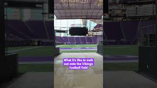 Walking out onto the Vikings football field at U.S. Bank Stadium