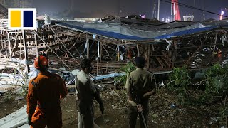 Giant hoarding collapse kills 14 in Mumbai