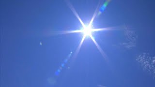 How will warmer temperatures affect spread of COVID-19?
