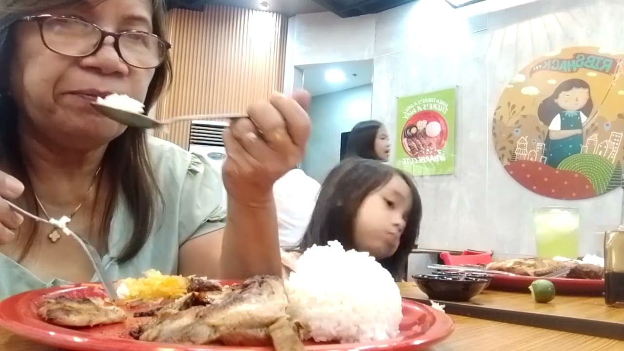 SM.down town on the fourth floor eating with my grand children and daughter