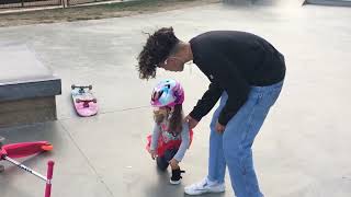 Skateboarder falls off skateboard and board ges flying into little girl on scooter