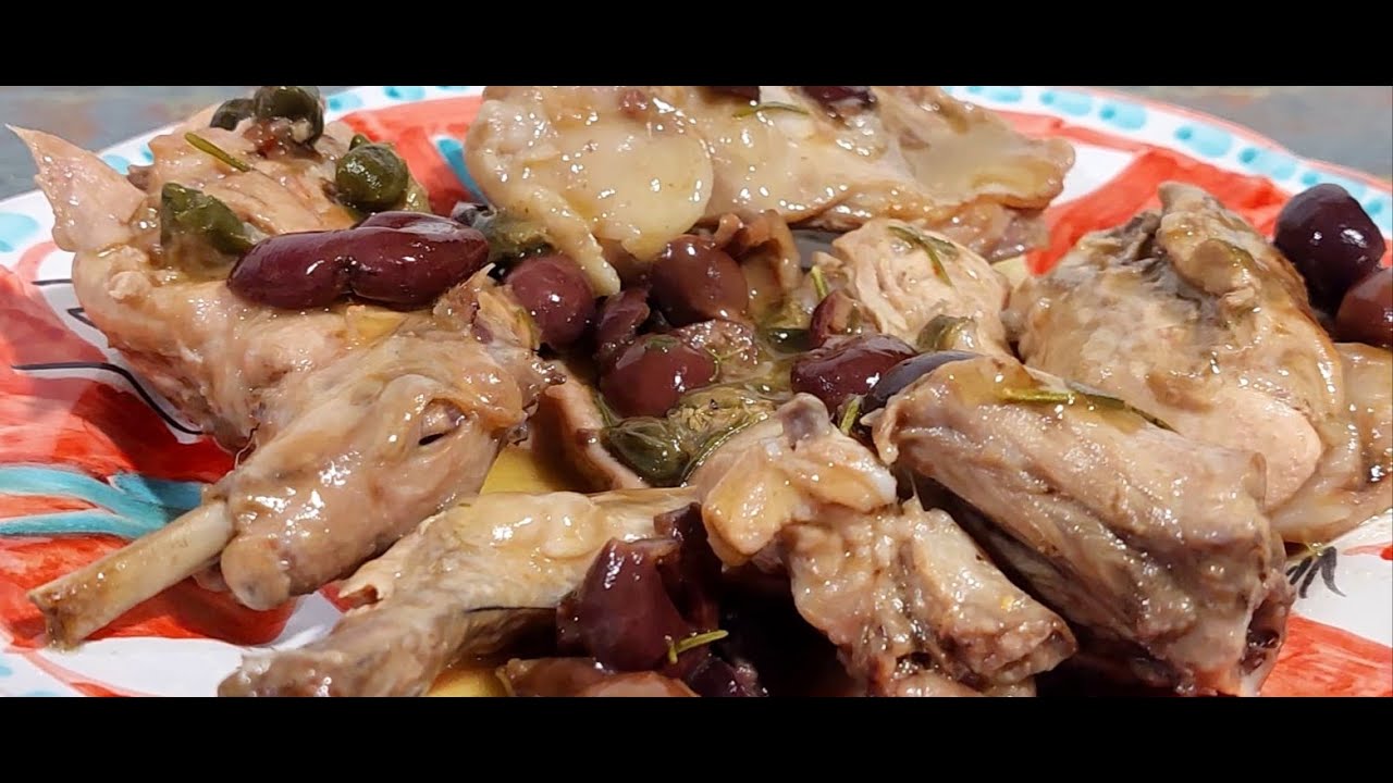 Coniglio in Umido con Olive Nere, Capperi ed Erbe Aromatiche – La Tradizione in Tavola