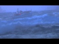 Asta B fishing boat coming in to harbour in heavy sea. Grindavik Iceland.