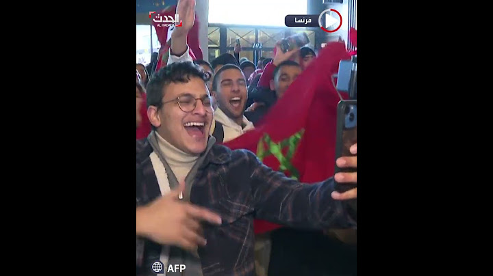 مشجعو المنتخب المغربي يحتفلون بفوزه وسط باريس