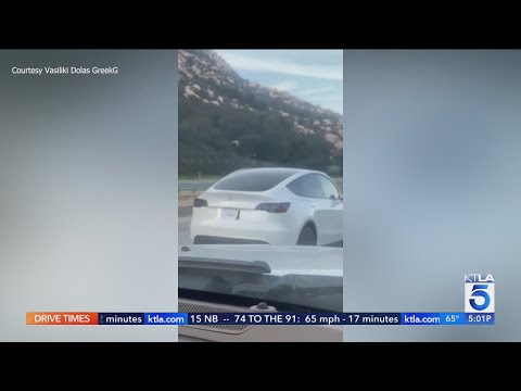 Video captures Tesla driver apparently asleep at the wheel on California freeway