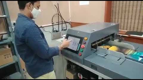 AUTOMATIC ALBUM BINDING MACHINE