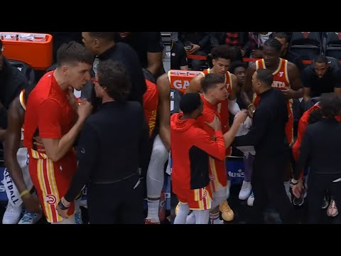 Bogdan Bogdanovic gets heated with coach on Hawks bench and needs to be held back 😳