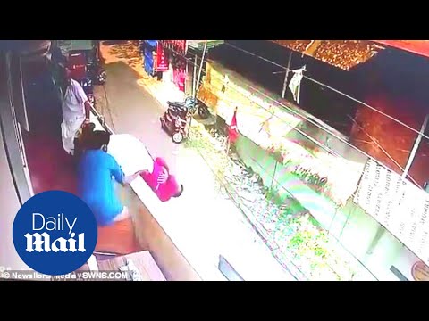 Incredible moment man falling from balcony is saved by hero bystander