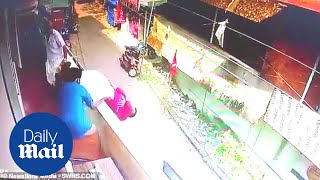 Incredible moment man falling from balcony is saved by hero bystander