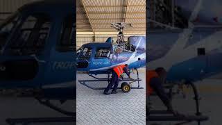 Installing rotor blades on a Eurocopter AS350 Helicopter