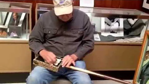 Randy McGee playing the Diddley Bow at the Highway...