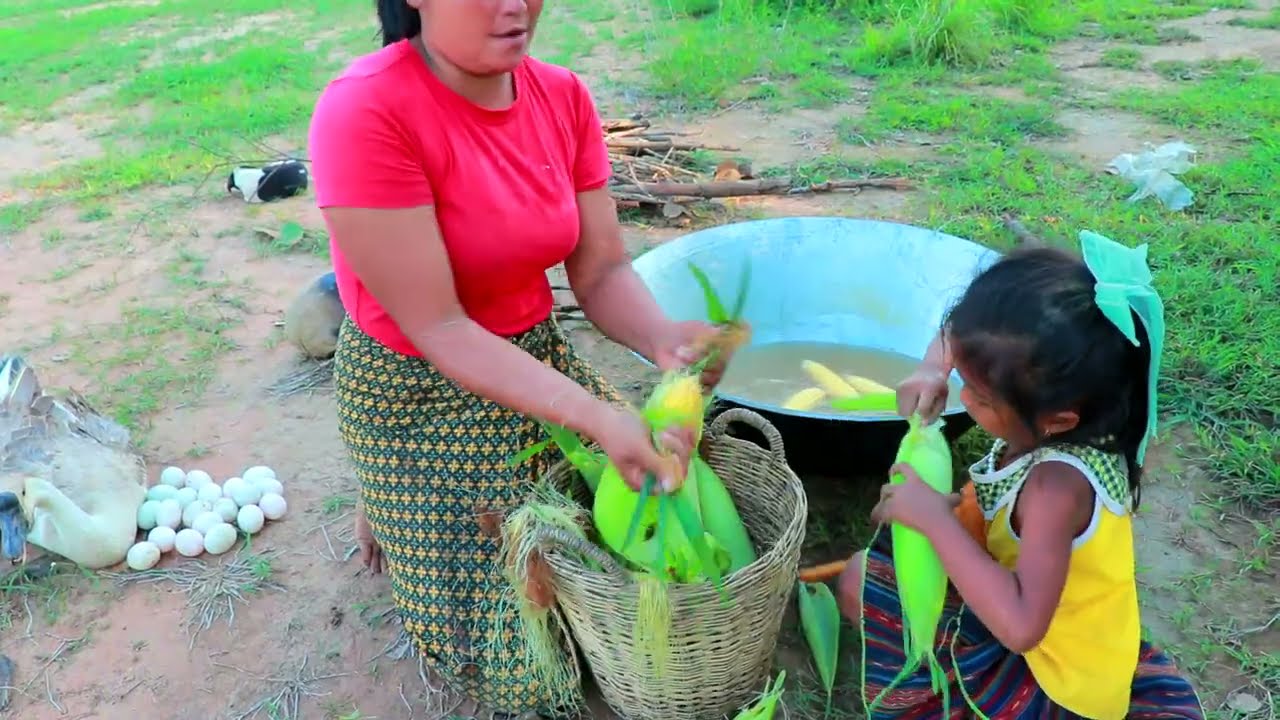 Primitive Life Village - Mother catches Goose eggs - Cute baby monkey Eating delicious Boild corn