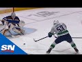 Bo Horvat Scores Five-Hole In OT Assisted By Quinn Hughes To Win Game 2