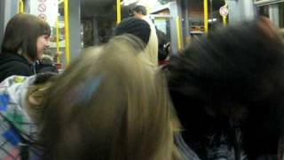Bethi + Chris headbang on the metro