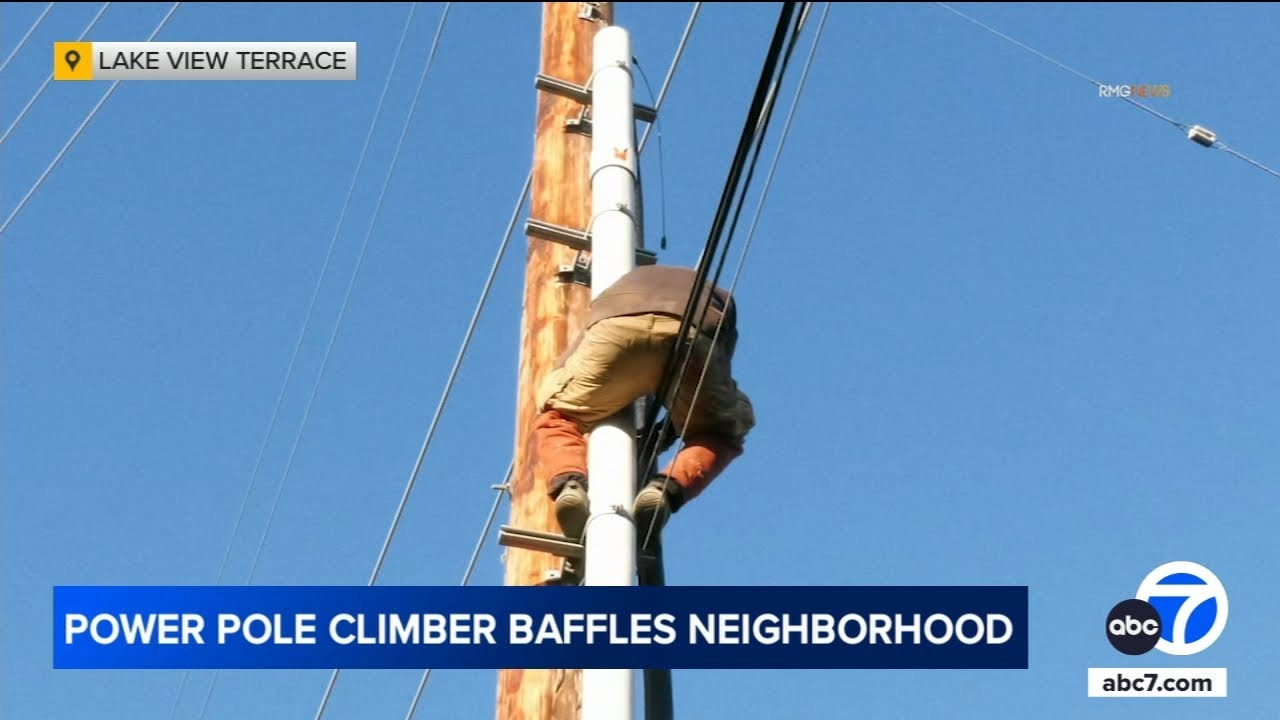 Man refuses to climb down power pole in Lake View Terrace - YouTube