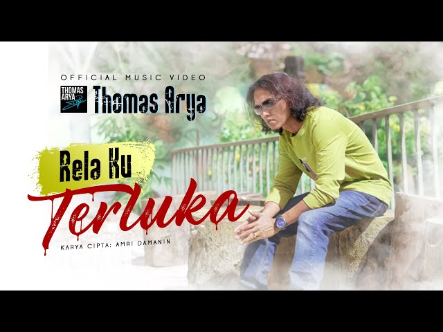 Thomas Arya - Rela Ku Terluka (Official Music Video) class=