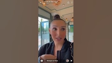 Thumbnail of Camélia fais un bisous sur le bras de kms