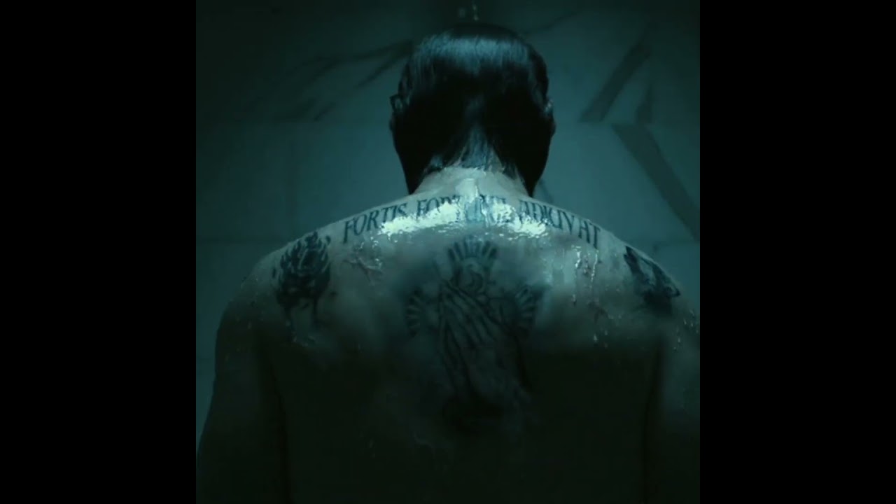 el pasado de JOHN WICK se revela en su tatuaje durante esta escena!? 