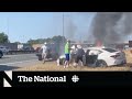Strangers rescue man from burning car on Toronto highway