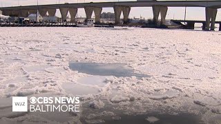 Ice cutting vessel breaks through ice on Chesapeake Bay