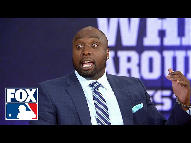 Dontrelle Willis reacts to Ronald Acuna being intentionally hit by a