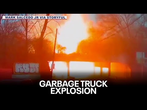 Garbage truck hits overpass, explodes