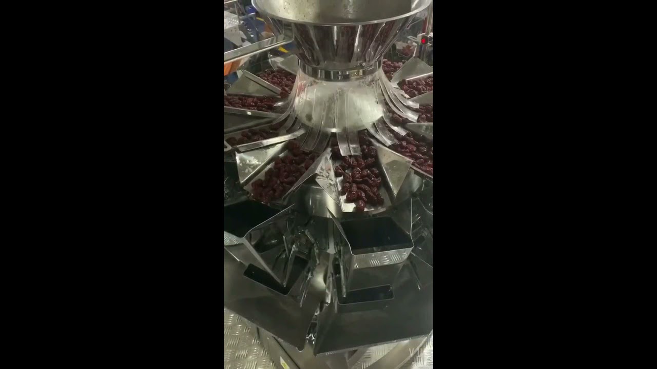 Automatic multi head weighing packing machine with vacuuming mechanism for dates