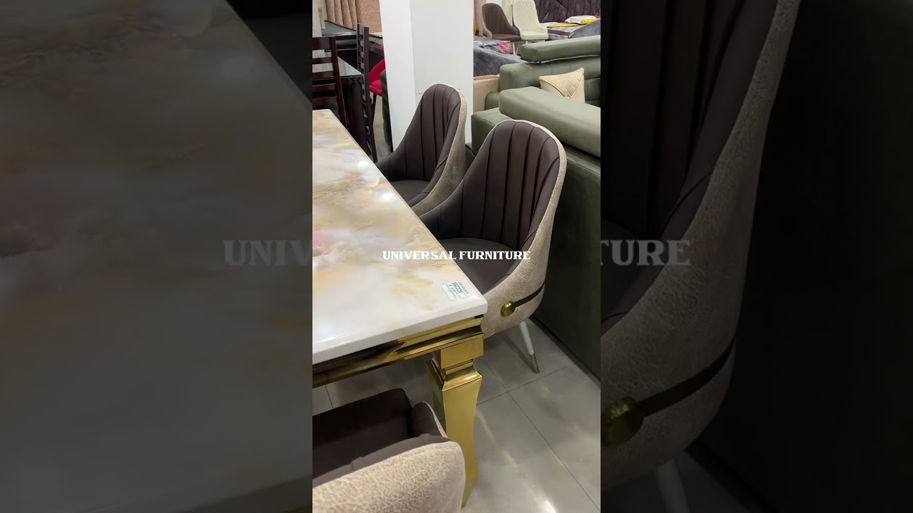 Imported marble dining table at Universal Furniture 