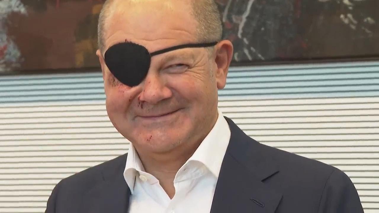 Scholz wears eye patch at SPD meeting after jogging accident - YouTube