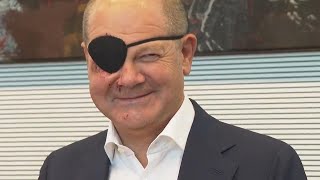 Scholz wears eye patch at SPD meeting after jogging accident