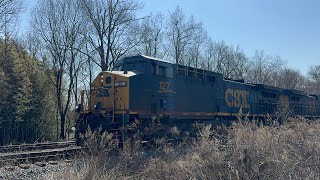 CSX 127 AC44CW leads M404 through Manville NJ with nice crew and cool rolling stock 3/26/2026