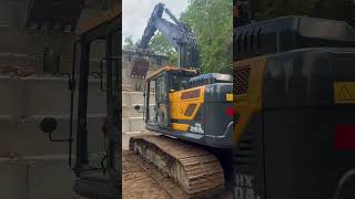 Excavator dirt shuffle when one machine don’t reach.