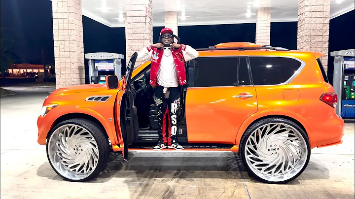 AD's Starburst Orange Infiniti QX on 34's Asantis with @Tiffaninashtv