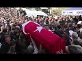 Mourning crowds carry coffins as Turkey buries school shooting victims | AFP