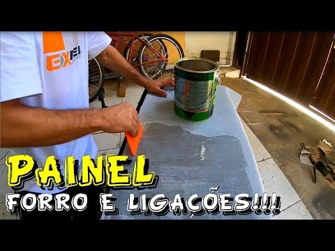 Vídeo: Como você cobre um painel de porta de vinil?