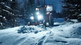 Old Tractor Plowing Snow In North Sweden