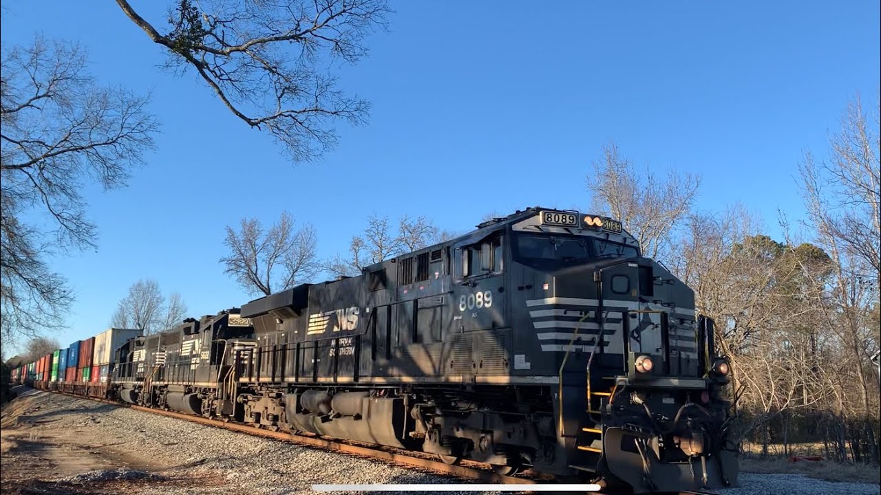 NS 242-08 slowly heads through Carlisle with a mid-train DPU setup & friendly engineer