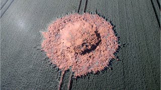 German WW2 bomb leaves giant crater in field