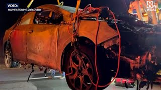 Video shows charred, melted electric vehicle that caught fire on back of car carrier