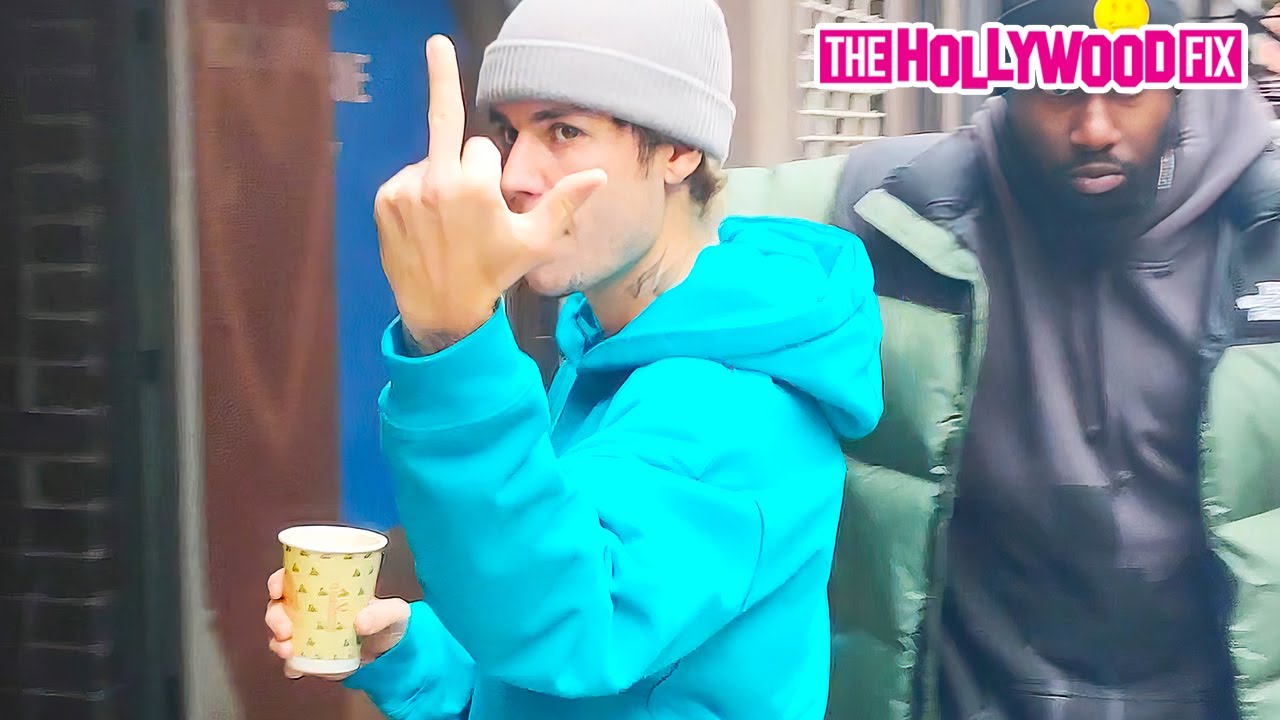 Justin Bieber Gives Paparazzi The Middle Finger While Pulling Up To The Studio With Hailey In N.Y.