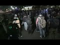 LIVE | Protesters, riot police clash outside ICE facility