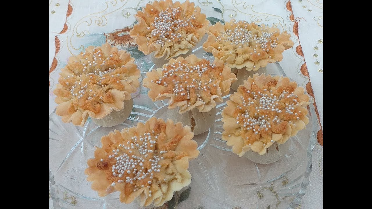 قندلات عاصمية مبسطة بحشوة معسلة. Recette de knidlettes